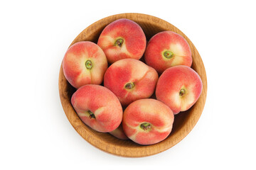 chinese flat donut peaches in wooden bowl isolated on white background. Top view. Flat lay