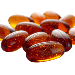 Close-up of translucent, amber-colored oval softgel capsules clustered against a black backdrop