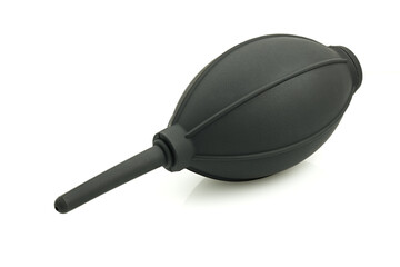 A rubber hand-held air pump for dust removal, isolated on a white background. This tool is designed for cleaning cameras, lenses, personal computers, keyboards, and mobile phones.
