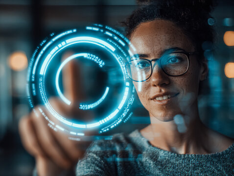 Female technology enthusiast engages with a holographic display, demonstrating interaction with digital elements and showcasing a modern workspace atmosphere
