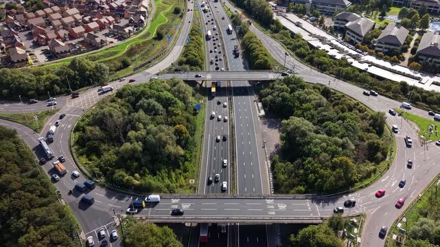Aerial video above M4 Motorway at junction 12 Reading, UK