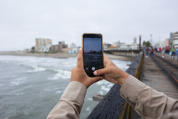 Photograph of the Pimentel Pier in Chiclayo, Peru a popular beach in northern Peru, known for its great food and rich coastal traditions