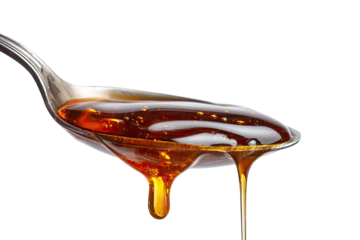 Honey dripping from a spoon (1)