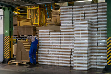 Fototapeta premium Storage of Cardboard Sheets in a Warehouse Space