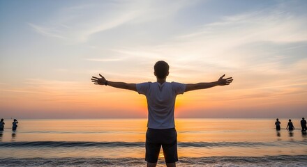Silhouette of a man with arms outstretched, embracing the sunset over the ocean, symbolizing freedom, peace, and a profound connection with nature and life