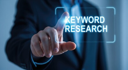 A businessman interacts with a digital display for keyword research analysis.