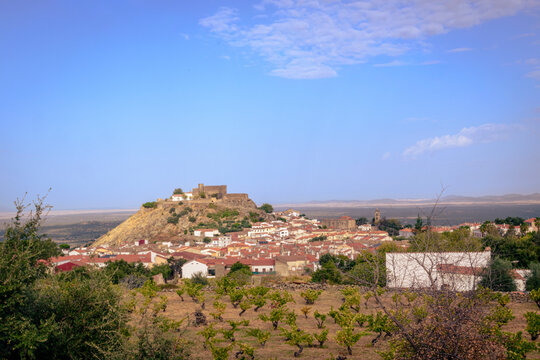 Montanchez Castle and Vineyards under Morning Light