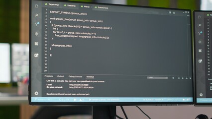 PC on office desk used to design and implement algorithms enabling deep learning. Artificial...