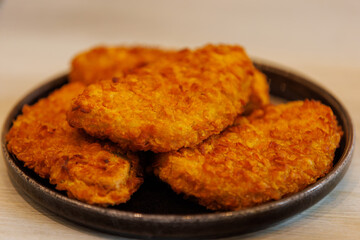 Delicious crispy breaded chicken cutlets plated beautifully for a family dinner