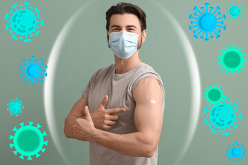 Young man in medical mask with applied patch showing thumb-up after vaccination on green background