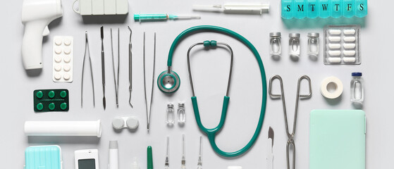 Medical supplies on grey background. Top view