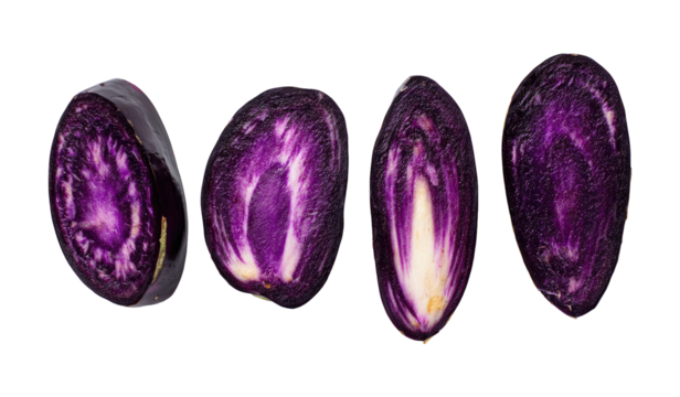 Four cross-sections of vibrant purple cabbage, showcasing inner white and purple layers.  Dark background isolates the produce