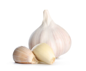 Fresh garlic and cloves on white background