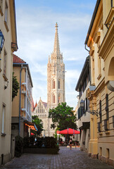 Fototapeta premium Buda Castle district street view featuring Matthias Church