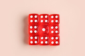 Red game dices on beige background