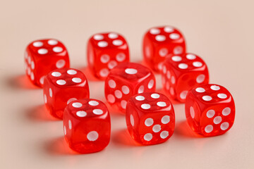 Red game dices on beige background