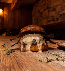 Smoky Bacon Burger with Melted Cheese & Caramelized Onions