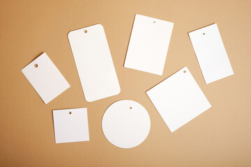 Blank tags on brown background,
