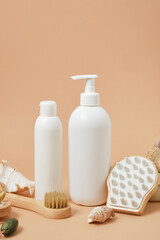 Cosmetic bottles and various massage products, mock-up beige background, eco-friendly materials, no plastic lifestyle