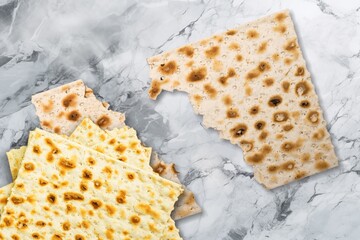 Matzah bread jewish food broken into two pieces