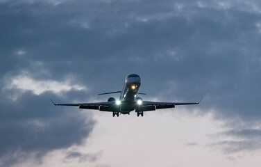 Silhouette of Plane Taking Off at Dusk