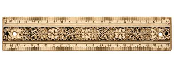 Ornate wooden ruler with decorative floral carvings