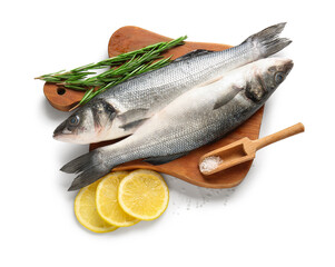 Cutting board with fresh seabass fish, lemon slices and rosemary twigs isolated on white background, closeup