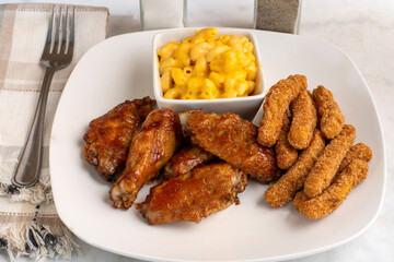 chicken wings and drumsticks with chicken fries