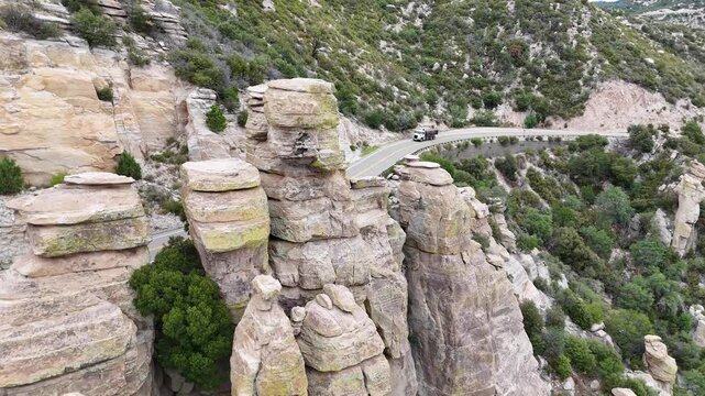 Granite hoodoos with passing truck on Mount Lemmon - Tucson, Arizona