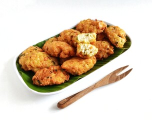 Perkedel tahu or fried tofu patties. Made of mixture; mashed tofu, small amount of tapioca flour, spring onion, egg, salt and pepper and deep fried. Crunchy outside,soft inside.