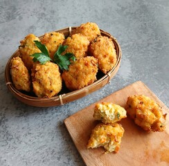 Perkedel tahu or fried tofu patties. Made of mixture; mashed tofu, small amount of tapioca flour, spring onion, egg, salt and pepper and deep fried. Crunchy outside,soft inside.