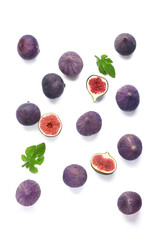 Many fresh ripe figs and leaves on white background