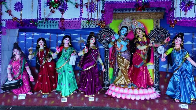 Idols of Radha Krishna and other deities are seen at the temporary puja pavilion on the occasion of Ras Mela Day at Dublar Char in the Sundarbans of Khulna district.