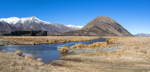 Snow capped mountains by lake Heron, Canterbury, New Zealand