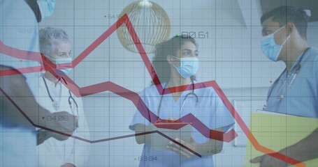 Discussing trends on line graph overlay in hospital corridor with clipboard tablet stethoscopes
