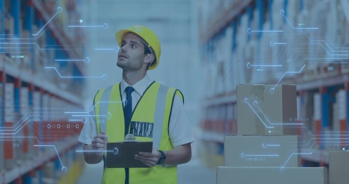 Inspecting supervisor in hardhat scanning racks with clipboard in warehouse aisle, digital overlay