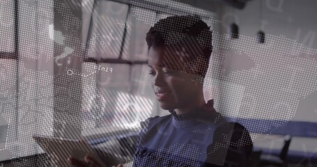 Standing adult woman holding tablet in office, with digital world map overlay and code fragments