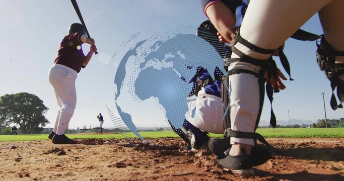 Crouching catcher wearing blue jersey catching ball on baseball field, with mitt, mask, copy space