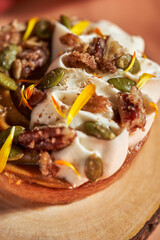 Close up of creamy pumpkin tart filling with golden crust