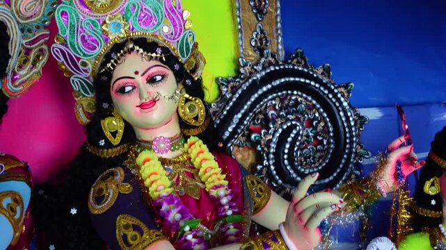 Idols of Radha Krishna and other deities are seen at the temporary puja pavilion on the occasion of Ras Mela Day at Dublar Char in the Sundarbans of Khulna district.