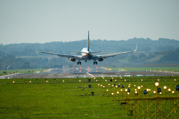 A passenger plane approaching landing at Krakow Balice Airport
