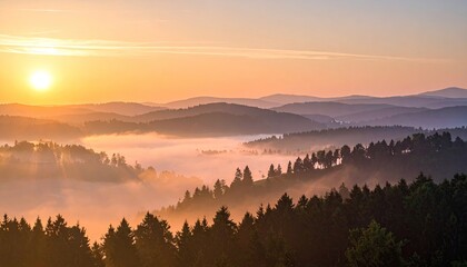Obraz premium Golden Sunrise Over Misty Valley with Forested Hills at Daybreak
