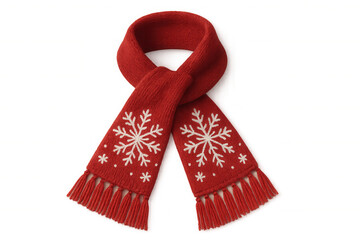 Red knitted scarf with white snowflake pattern and fringes, symbolizing winter, christmas, and festive fashion