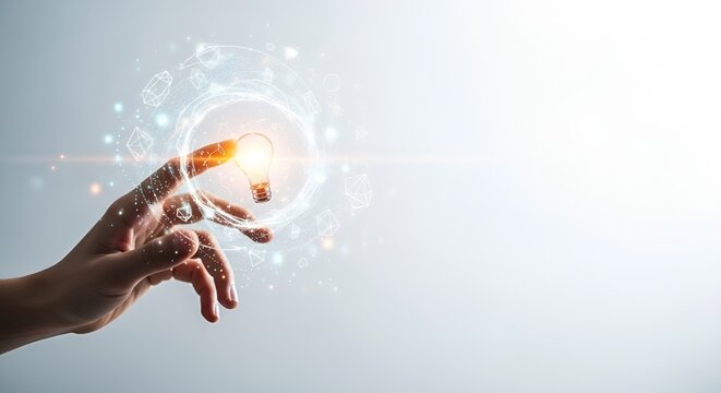 Hand touching glowing light bulb, symbolizing innovative business ideas and digital transformation.