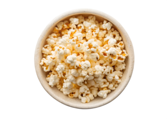 A top down view of a light brown bowl filled with freshly popped popcorn and a few pieces of white marshmallow on a black background