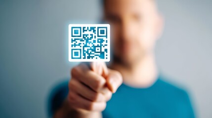 Modern man holding qr code for digital information access and seamless technology interaction.