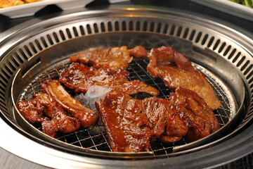 Grilled Korean Pork Ribs on a Barbecue Grate