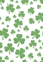 A repeating pattern of green shamrocks on a white background.