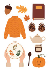 Cozy autumn activities a warm sweater a good book and seasonal decorations.