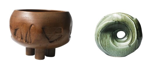 Close-up of ancient pottery in an archaeological museum exhibit of historical culture